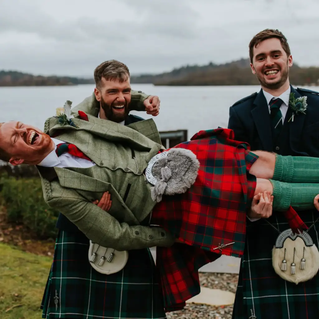 men wearing scottish kilts